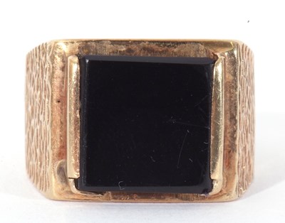 Lot 22 - 9ct gold and onyx ring, the square black onyx...