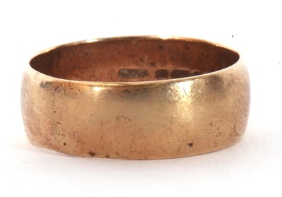 Lot 30 - 9ct gold wedding ring, the wide plain polished...