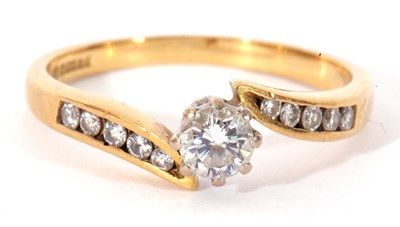 Lot 68 - 18ct gold single stone ring, a cross over...