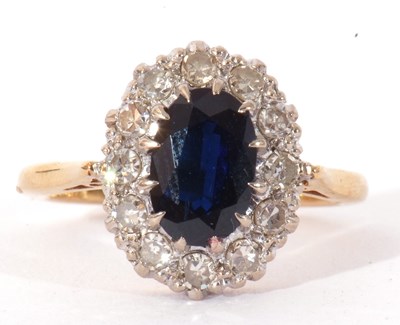 Lot 81 - 18ct gold sapphire and diamond cluster ring,...