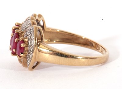 Lot 83 - Modern 9ct gold ruby and diamond ring...