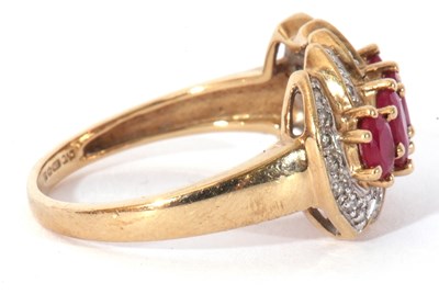 Lot 83 - Modern 9ct gold ruby and diamond ring...