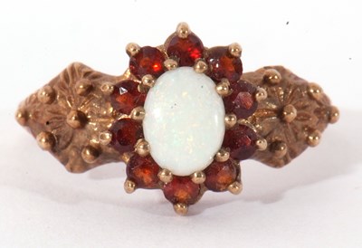 Lot 88 - 9ct gold opal and garnet cluster ring, the...