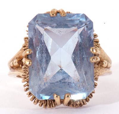 Lot 93 - 9ct gold light blue stone dress ring, the...