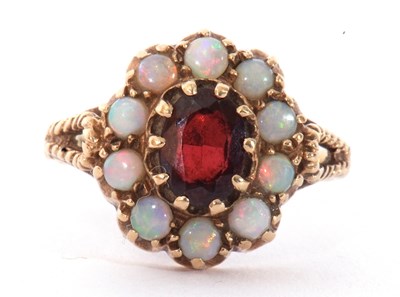 Lot 95 - 9ct gold garnet and opal cluster ring, the...