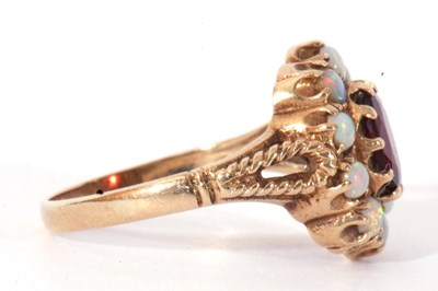 Lot 95 - 9ct gold garnet and opal cluster ring, the...