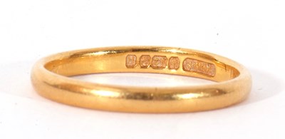 Lot 100 - 22ct gold wedding ring of plain polished...