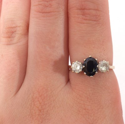 Lot 103 - 9ct gold cubic zirconia and blue stone ring,...