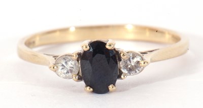 Lot 106 - 9ct gold sapphire and diamond three stone ring...