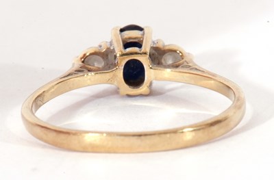 Lot 106 - 9ct gold sapphire and diamond three stone ring...