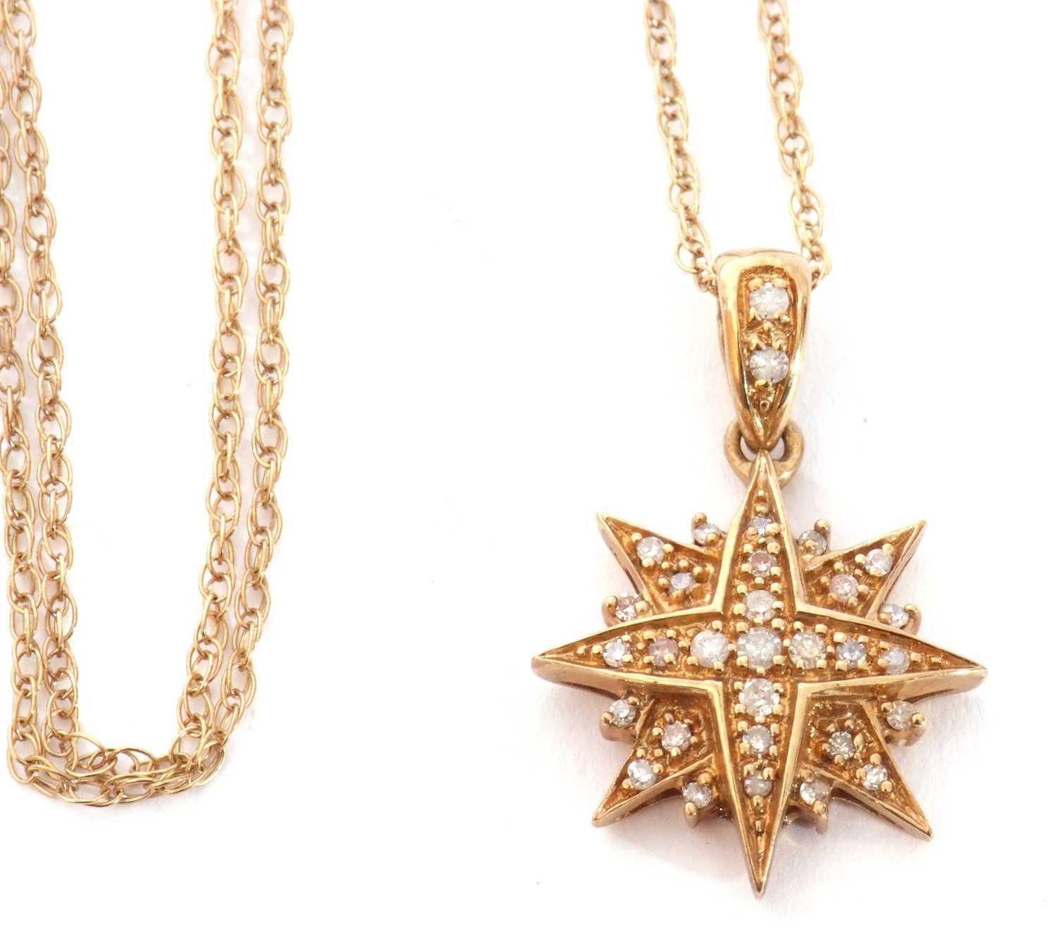 Lot 142 - 9ct gold starburst pendant highlighted...