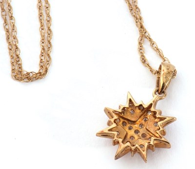 Lot 142 - 9ct gold starburst pendant highlighted...