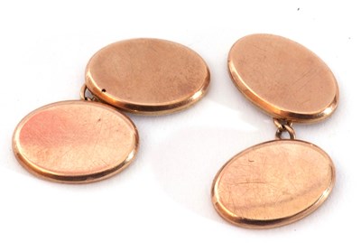 Lot 144 - Pair of 9ct gold cuff links of oval shape,...