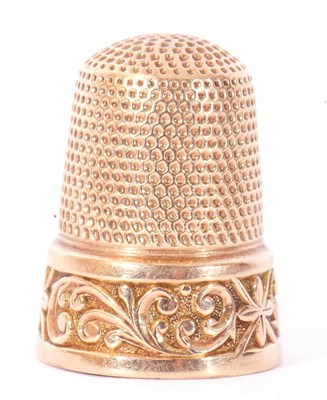 Lot 147 - Vintage yellow metal thimble of typical form,...