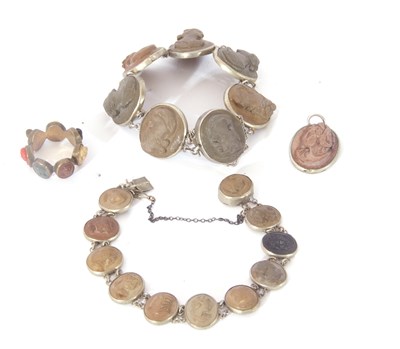 Lot 250 - Vintage lava cameo bracelet featuring seven...