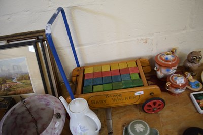 Lot 635 - TRI-ANG BABY WALKER WITH BUILDING BLOCKS