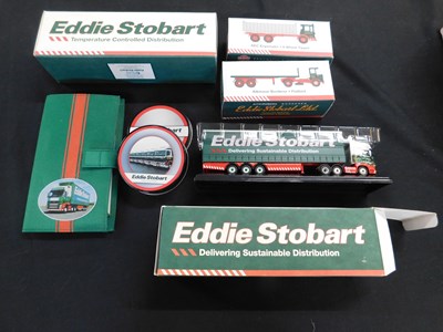 Lot 516 - Small box Eddie Stobart collectibles including...