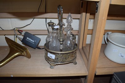 Lot 516 - SILVER PLATED CRUET STAND WITH GLASS BOTTLES