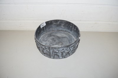 Lot 29 - A SHALLOW CIRCULAR LEAD BOWL DECORATED WITH A...