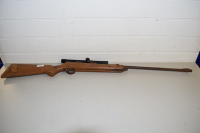 Lot 33 - A VINTAGE AIR RIFLE WITH SCOPE