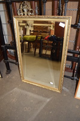 Lot 736 - MODERN RECTANGULAR BEVELED WALL MIRROR IN GILT...