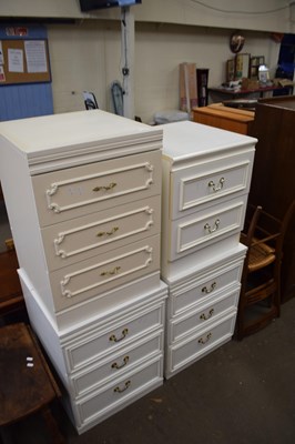 Lot 847 - FOUR WHITE BEDSIDE CABINETS