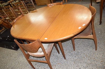 Lot 242 - G-PLAN TEAK CIRCULAR EXTENDING DINING TABLE...