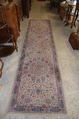 Lot 393 - 20TH CENTURY FLORAL DECORATED RUNNER CARPET...