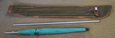 Lot 214 - Fishing rod bag with rod rests and an umbrella...