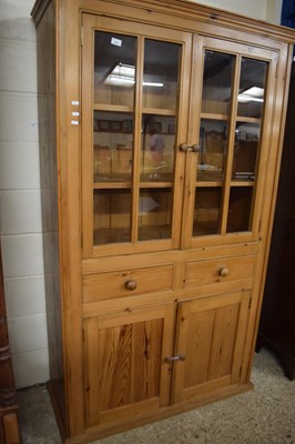 Lot 303 - 20TH CENTURY PINE CUPBOARD WITH GLAZED TOP...