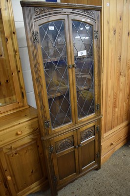 Lot 307 - OLD CHARM OAK CORNER CABINET WITH LEAD GLAZED...