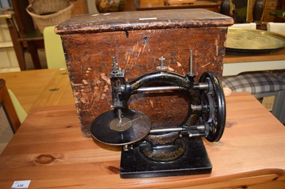 Lot 339 - VINTAGE CAST IRON MANUAL SEWING MACHINE WITH...