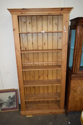 Lot 691 - MODERN PINE OPEN FRONT BOOK CASE CABINET