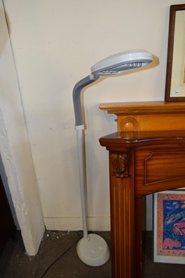 Lot 695 - AN ADJUSTABLE FLOOR STANDING CRAFT LAMP