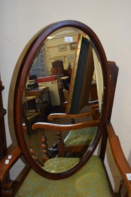 Lot 700 - MAHOGANY OVAL FRAMED BEVELLED WALL MIRROR