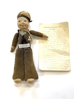Lot 94 - An early 20th century cloth doll, formed as a...
