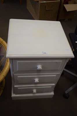 Lot 770 - WHITE PAINTED THREE DRAWER BEDSIDE CABINET