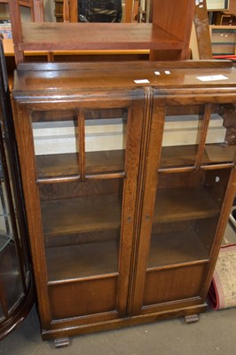 Lot 778 - SMALL OAK FRAMED GLAZED BOOK CASE CABINET