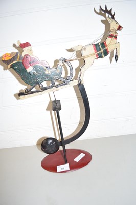 Lot 83 - GRAVITY DRIVEN ROCKING SANTA CLAUSE AND SLEIGH...