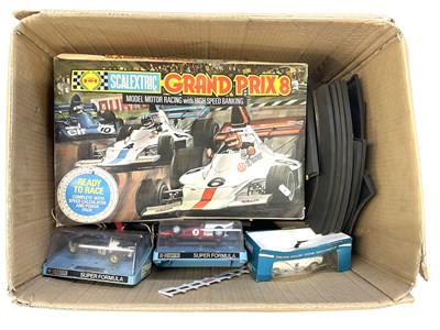 Lot 84 - A box containing a boxed Scalextric Grand Prix...