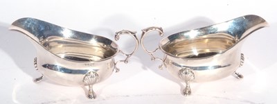 Lot 15 - Pair George VI silver sauce boats of typical...