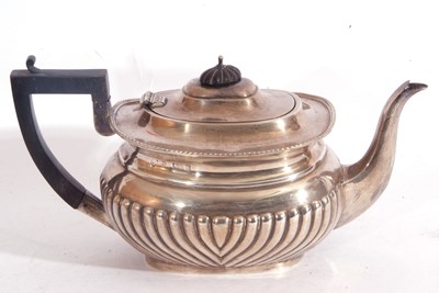 Lot 51 - Edward VII silver teapot of oval form having a...