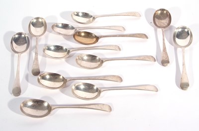 Lot 71 - Set of twelve George V silver dessert spoons,...