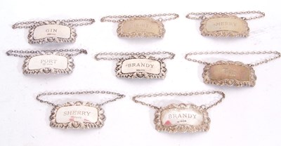 Lot 88 - Group of silver wine labels to include two...