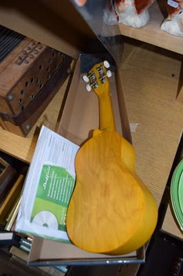 Lot 557 - MODERN UKULELE AND ACCOMPANYING CD AND...