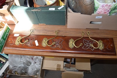 Lot 613 - HARDWOOD AND BRASS MOUNTED COAT RACK