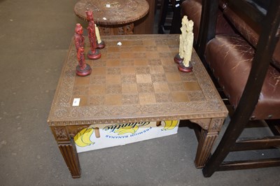 Lot 785 - LARGE 20TH CENTURY CARVED CHESS TABLE TOGETHER...