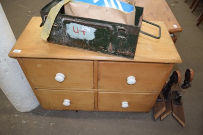 Lot 831 - LOW PINE FOUR DRAWER CHEST WITH PORCELAIN HANDLES