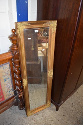 Lot 202 - RECTANGULAR BEVELED WALL MIRROR IN GILT FINISH...