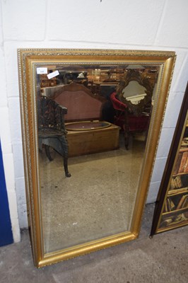 Lot 326 - MODERN RECTANGULAR BEVELED WALL MIRROR IN GILT...